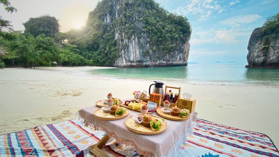 Krabi: Private Luxury Boat to Hong Islands Sunrise & Picnic - Cruising from the private pier on a classic boat