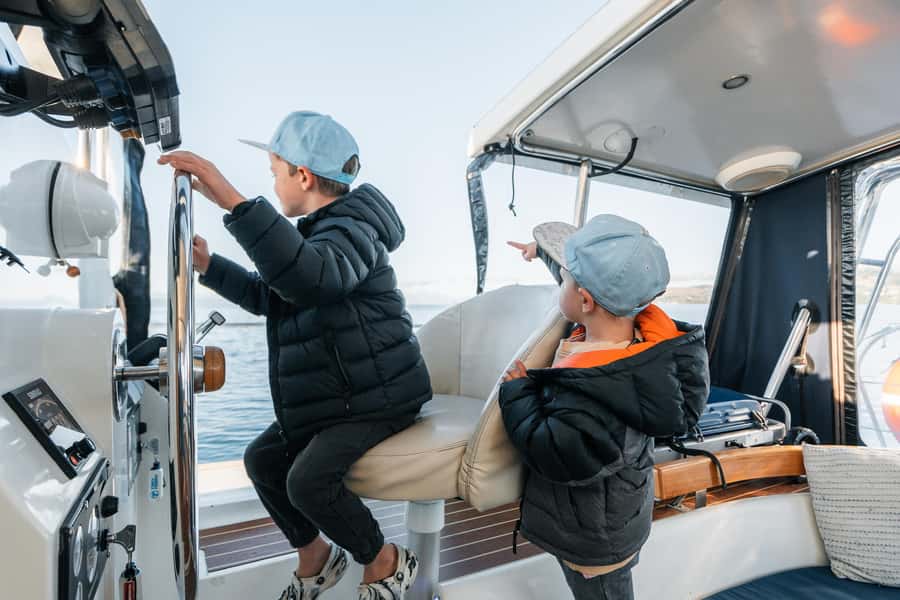 Lake Taupo: Luxury Sailing Catamaran to Māori Rock Carvings - A cold-water swim in a sheltered bay