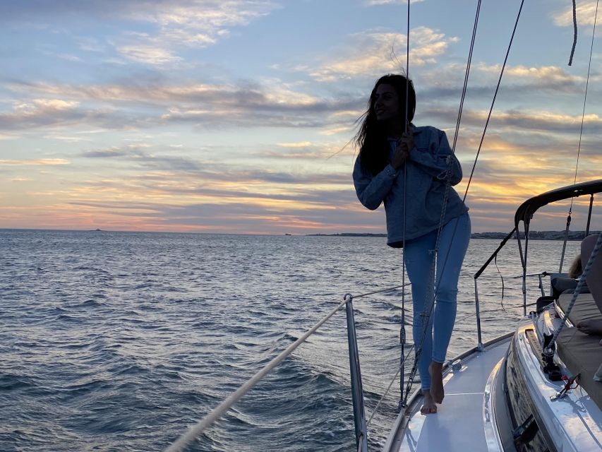 Lisbon: Private Tagus River Sunset Cruise on a Luxury Boat - Passing under the 25 de Abril Bridge
