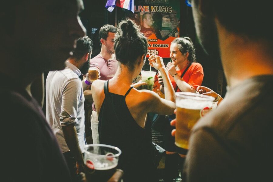 Lisbon: Pub Crawl with Open Bar and VIP Club Entry - Walking through Bairro Alto’s three bars
