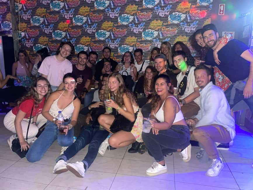 Lisbon: Pub Crawl with Open Bar and VIP Club Entry - Two shots, drink discounts, and what you actually pay for