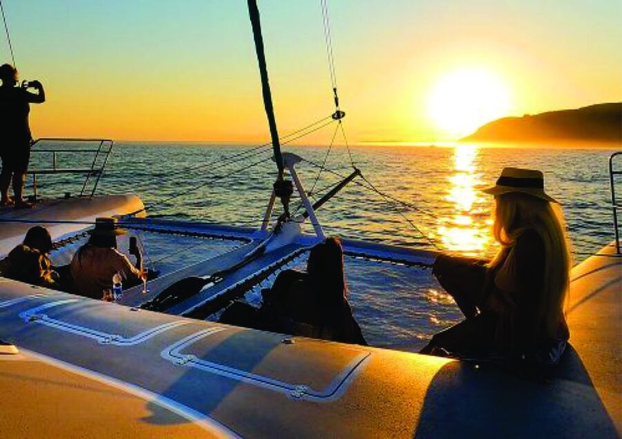 Lisbon: Sunset and Wine Luxury Catamaran Cruise - Leaving Alcantara for an evening on the river