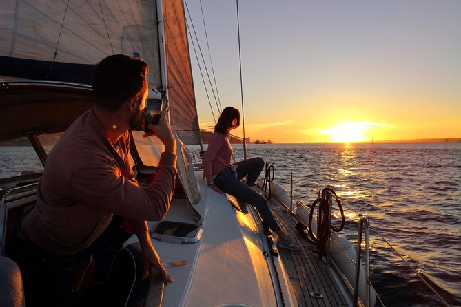 Lisbon Sunset Sailing Tour on Luxury Sailing Yacht with 2 Drinks - Two Drinks, Portuguese Cheese, and a Relaxed Pace