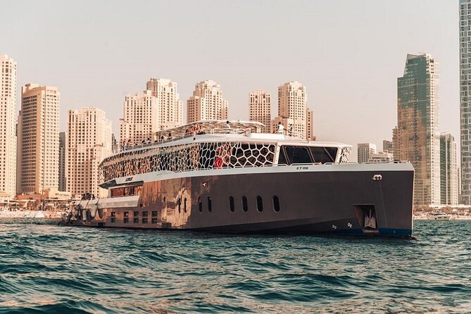 Lotus Mega Yacht Luxury Cruise with Live DJ, Dinner & Transfers - Live DJ music, dancing, and the social mood