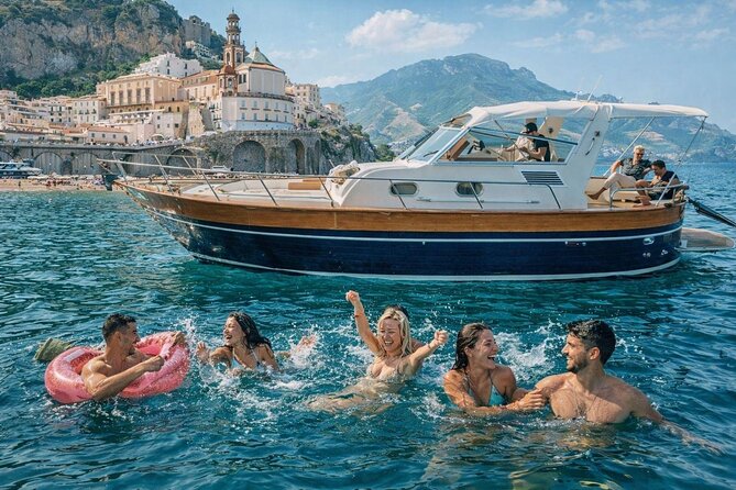 Luxury Amalfi Coast Boat Tour with Swim & Prosecco – Small Group - The coast toward Positano and Li Galli