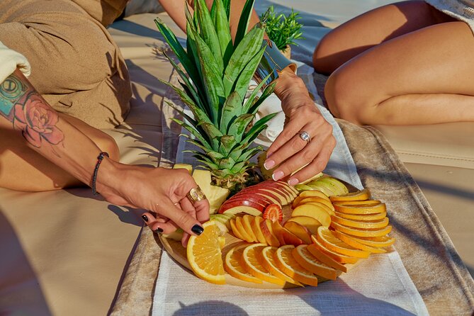 Luxury Balos Cruise: Sunset, Snacks, Drinks & Transfer - Swimming, snorkeling, and paddleboarding from the boat