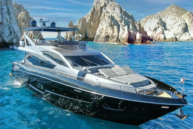 Luxury Black Yacht in Cabo - Medano Beach: drinks, food, and one last view