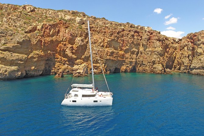 Luxury Catamaran Cruise from Athens with Traditional Greek Meal and BBQ - A Greek BBQ served on deck