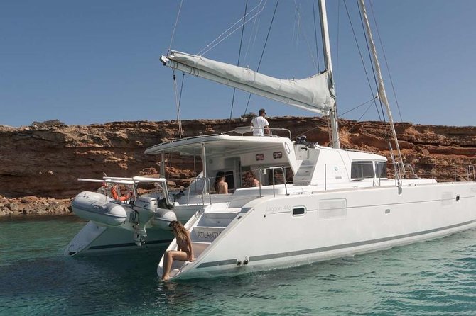 Luxury Catamaran Semi private cruise with meals & drinks and transportation. - Setting out from Mykonos New Port