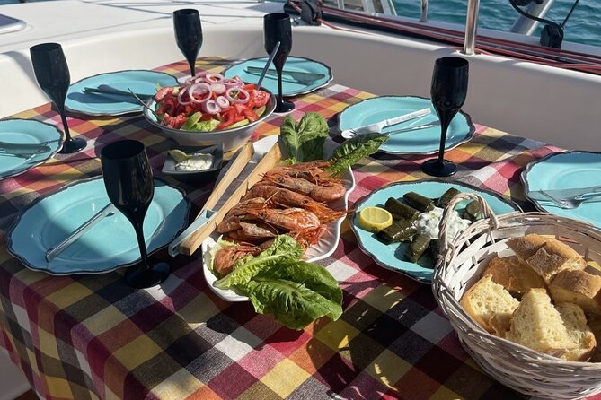 Luxury Catamaran Semi private cruise with meals & drinks and transportation. - Returning past Little Venice and the windmills