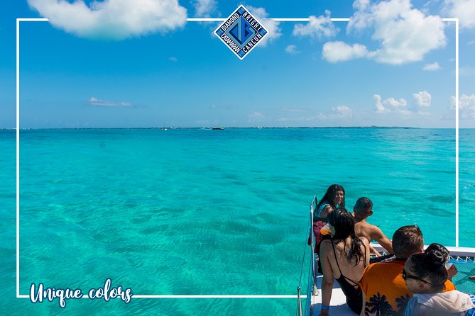 Luxury Catamaran tour to Isla Mujeres with Transportation from Cancun - Snorkeling over the Caribbean reef