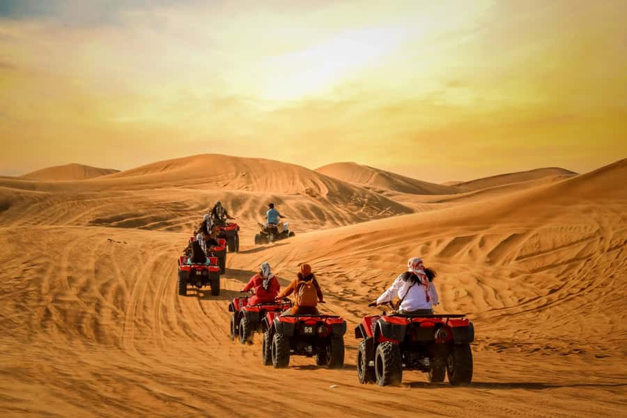 Luxury Dubai Desert Safari, BBQ, Camel Ride, Quad Bike, Show - An evening of Tanoura, belly dancing, and fire