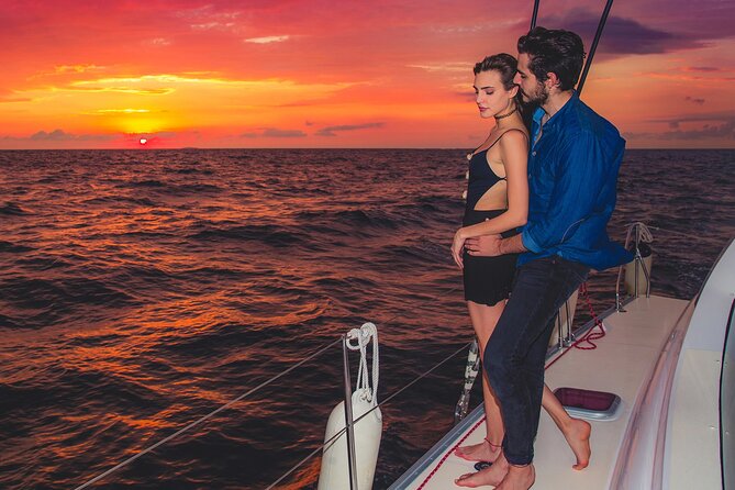 Luxury Sunset Sailing Cruise in Cancun with Light Dinner and Open Bar - Boarding the catamaran and finding your place