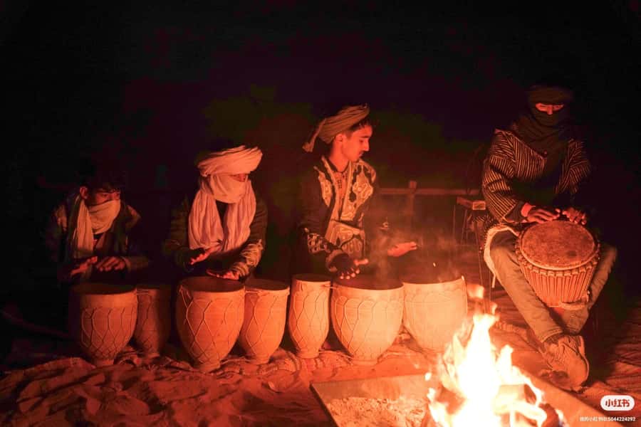 Merzouga: Overnight Stay in Luxury Desert Tent with Dinner - Tea, Moroccan dinner, and a night by the fire