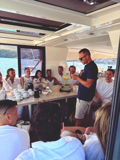 Milos: Full Day Luxury Catamaran with Full Meal & Open Bar - Triades Beach: your first chance to swim
