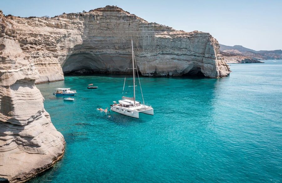 Milos: Full Day Luxury Catamaran with Full Meal & Open Bar - Leaving Adamantas with coffee and clear instructions