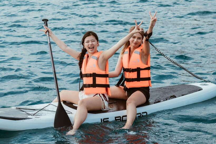 Nha Trang: VIP YACHT TOUR ( BBQ, Water activities) - SUP, snorkeling, swimming, and the yacht slide
