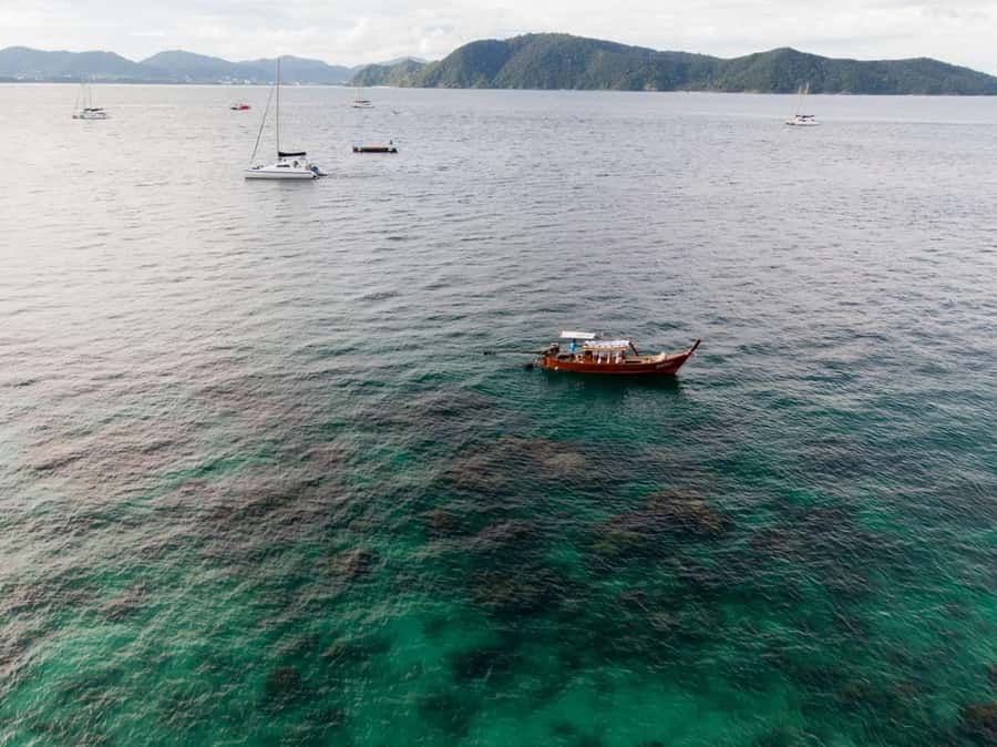 Phuket: Coral Island Luxury Long Tail Boat Half-Day Tour - Getting to Chalong Pier and Coral Island