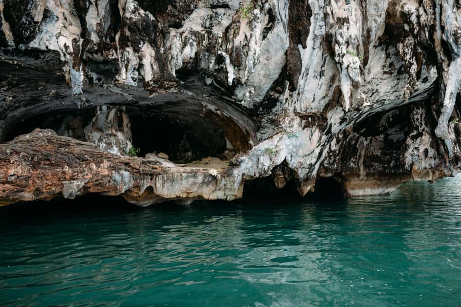 Phuket: Luxury Small Group Phang Nga and Beyond Tour - A swim through a narrow passage