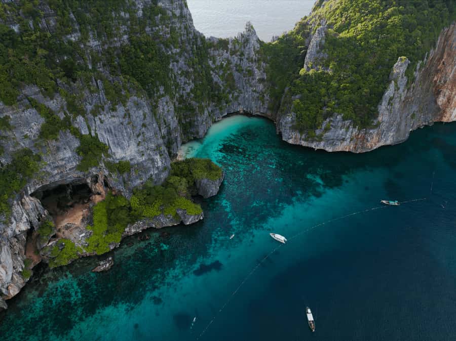 Phuket: Phi Phi Island & Maya Bay Luxury Yacht Day Tour - Swimming and snorkeling around Phi Phi