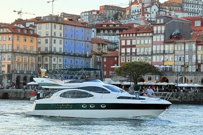 Porto: Luxury Yacht Cruise with Wine Tasting & Snacks - The first river views: Porto and Vila Nova de Gaia