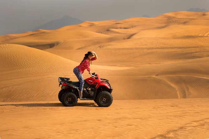 Premium Dubai Red Dunes with quadbike, camel ride and VIP Dinner - Dune bashing in Lahbab