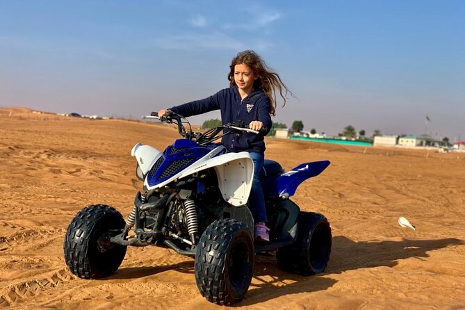 Premium Evening Desert Safari, Quad Bike, Camel & VIP BBQ Dinner - Lahbab’s red dunes, dune bashing, and sandboarding