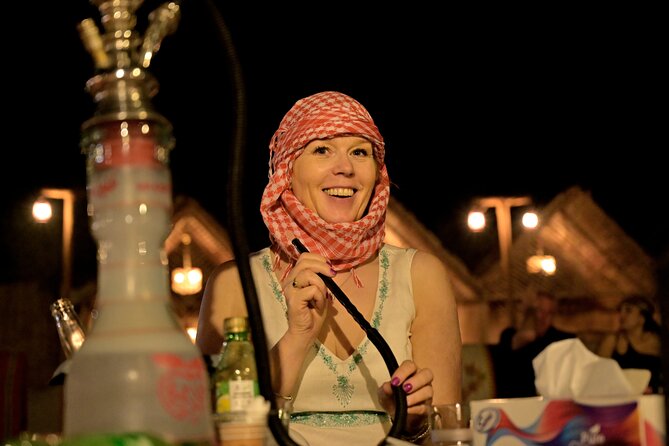 Premium Evening Desert Safari, Quad Bike, Camel & VIP BBQ Dinner - The Al Aweer camp after sunset