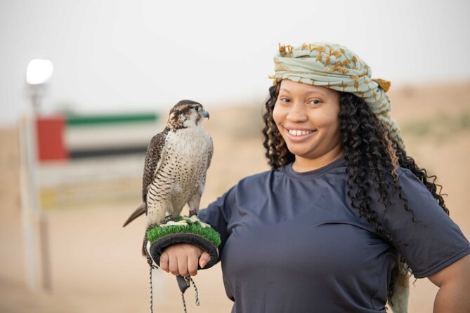 Premium Red Dunes Bashing with Quad Bike, Camel, Falcon &VIP Camp - Red Dunes dune bashing and sandboarding