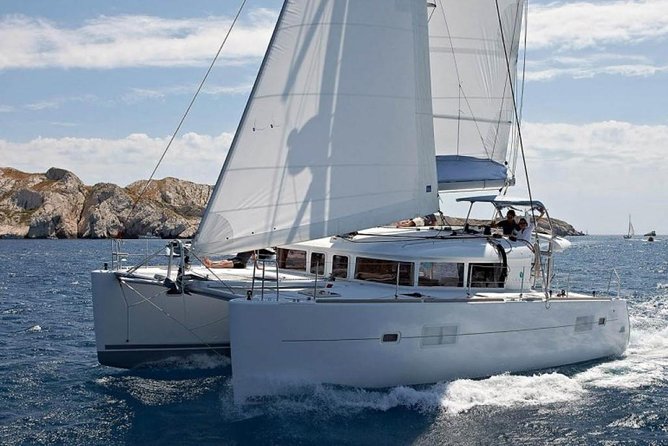 Private Luxury Santorini Catamaran Cruise with Port Pickup - A private way to see Santorini beyond the cliff towns