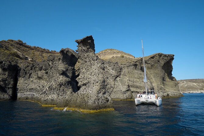 Private Luxury Santorini Catamaran Cruise with Port Pickup - Daylight sailing or a sunset cruise
