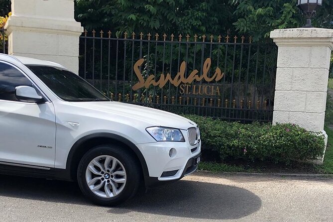 Private Round Trip Airport (UVF) Transfer: Luxury SUV - Arriving at UVF and finding your driver