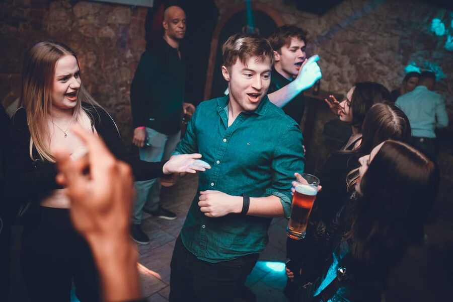 Pub Crawl - 1-hour Open Bar then Vip to 5 Clubs - Krakow - Walking through Krakow’s Old Town