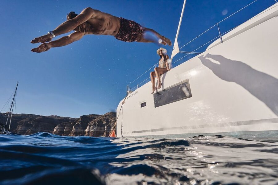 Santorini: Caldera Luxury Catamaran Cruise w/ Meal & Drinks - Hotel pickup and the ride to Vlichada Marina