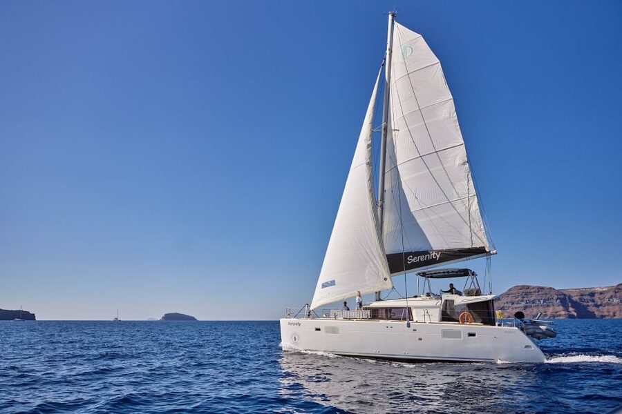 Santorini: Day Luxury Catamaran Cruise with Meal & Drinks - What this four-hour cruise actually feels like