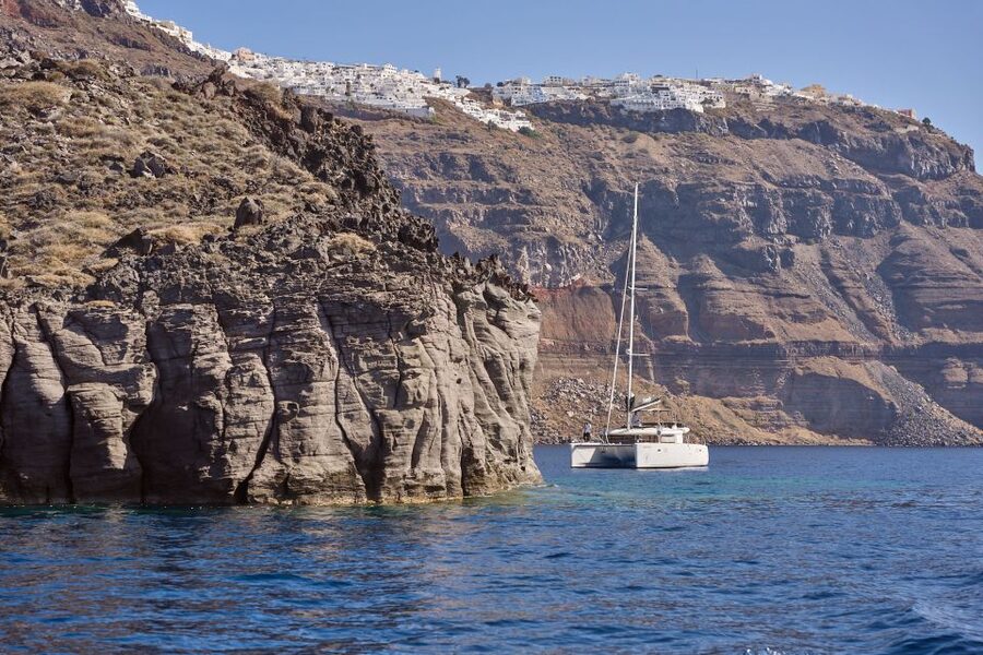 Santorini: Day Luxury Catamaran Cruise with Meal & Drinks - The volcanic islets bring the strongest scenery