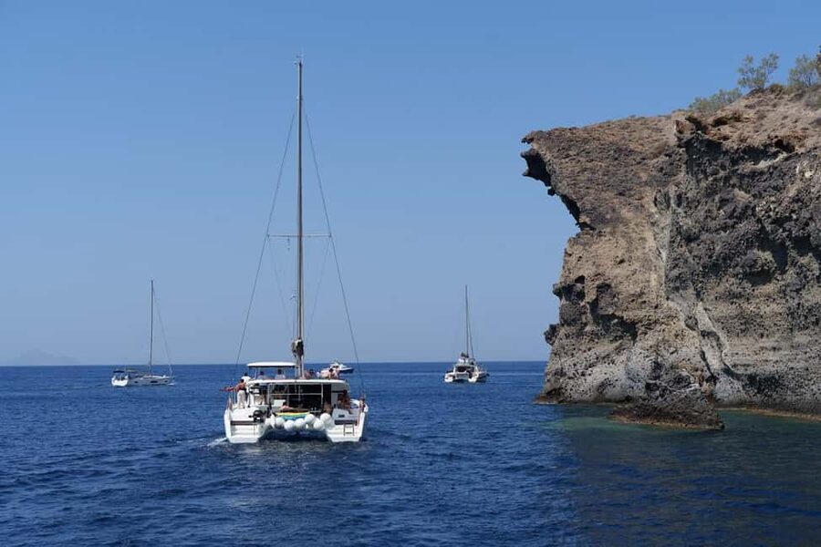 Santorini: Luxury Caldera Cruise With Meal & Drinks - Sea conditions, safety, and comfort