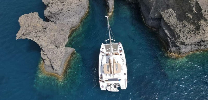 Santorini: Luxury Catamaran Cruise with Lunch, BBQ & Drinks - Thirasia combines swimming, lunch, and views