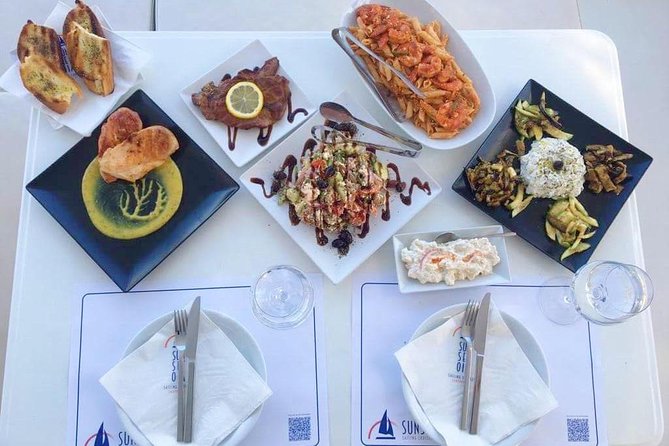 Santorini Luxury Catamaran Day Cruise with BBQ,drinks,transfer - Red Beach and the final swim