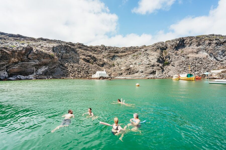 Santorini: Luxury Catamaran Day Trip with Meal and Open Bar - Sunset below Oia