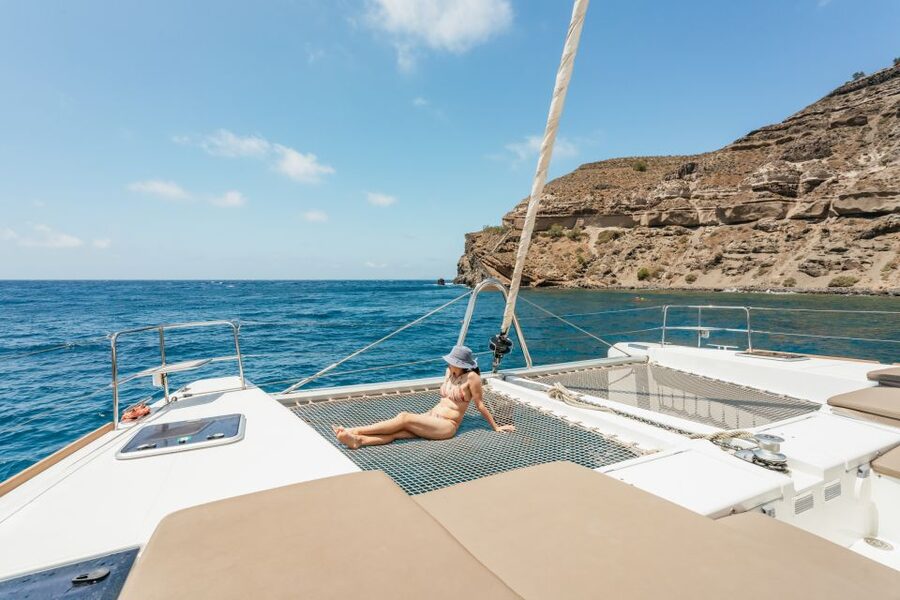 Santorini: Luxury Catamaran Day Trip with Meal and Open Bar - Choosing morning calm or sunset color