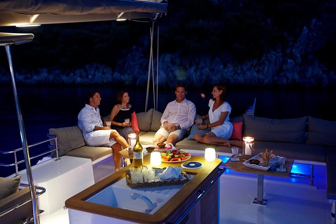 Santorini Luxury Catamaran Sunset Cruise with BBQ, Drink and Transfer - Sunset on the Caldera