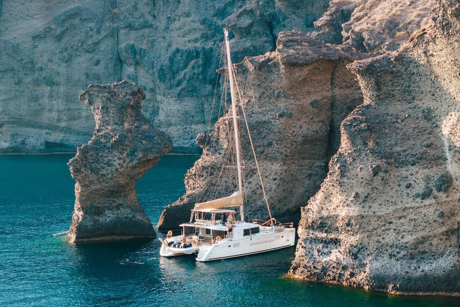 Santorini: Luxury Sunset Cruise with Dinner, BBQ, and Drinks - A closer look at the catamaran and crew