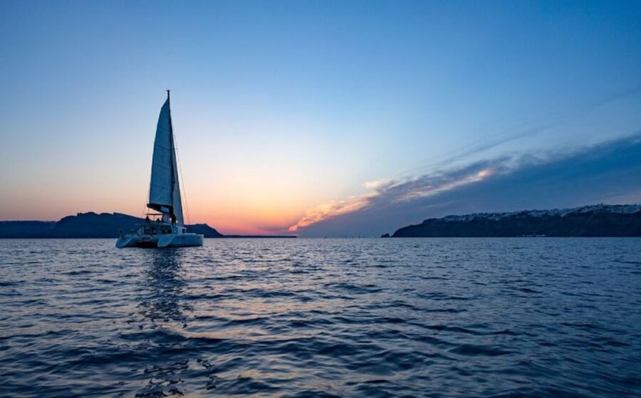 Santorini: Luxury Sunset Cruise with Dinner & Open Bar - From hotel pickup to Ammoudi Bay