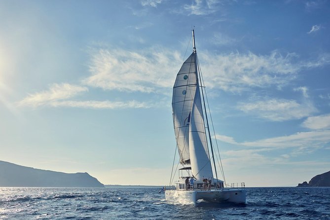 Santorini Sunset Luxury Sailing Catamaran Cruise with BBQ, drinks, transfer - The Sunset Option and the View Toward Oia