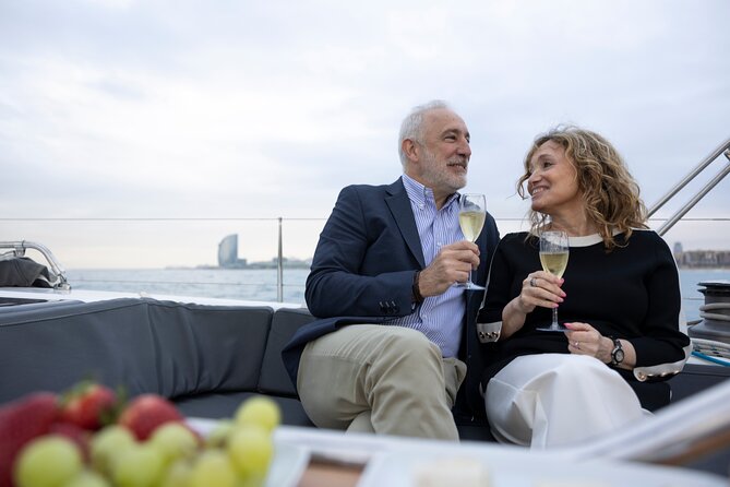 Sunset On A Luxury Sailboat From Port Olimpic - What to Wear for an Evening at Sea