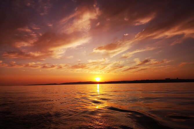 Sunset on a Luxury Sailing Yacht from Vilamoura (Max 12 Guests) - Snacks, drinks, and music on board