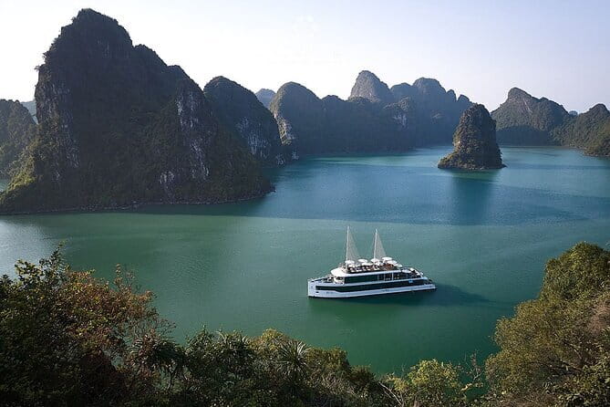 Taliya Day Cruise: Top Luxury Tour in Halong Bay & Lan Ha Bay - A bamboo boat through Bright Cave