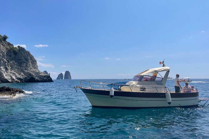 Three Hour Private Guided Tour of Capri with a luxury Gozzo cabin cruiser - The Faraglioni, Capri’s great farewell