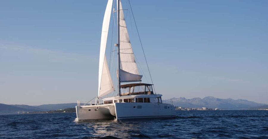 Tromsø: Fjord and Islands Luxury Catamaran Cruise - Thermal suits, day beds, and the cold-weather reality